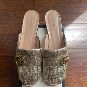 Gucci gold loafers